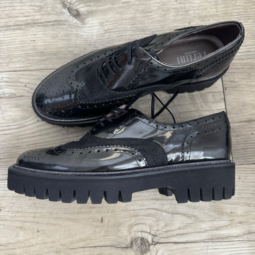 Black leather brogue shoes with platform sole